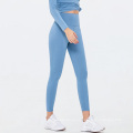 Leggings deportivos transpirables Gimnasio de yoga medias de jogging Mujeres Correr pantalones Leggings con bolsillos